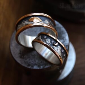 Комбинированные обручальные кольца: день-ночь